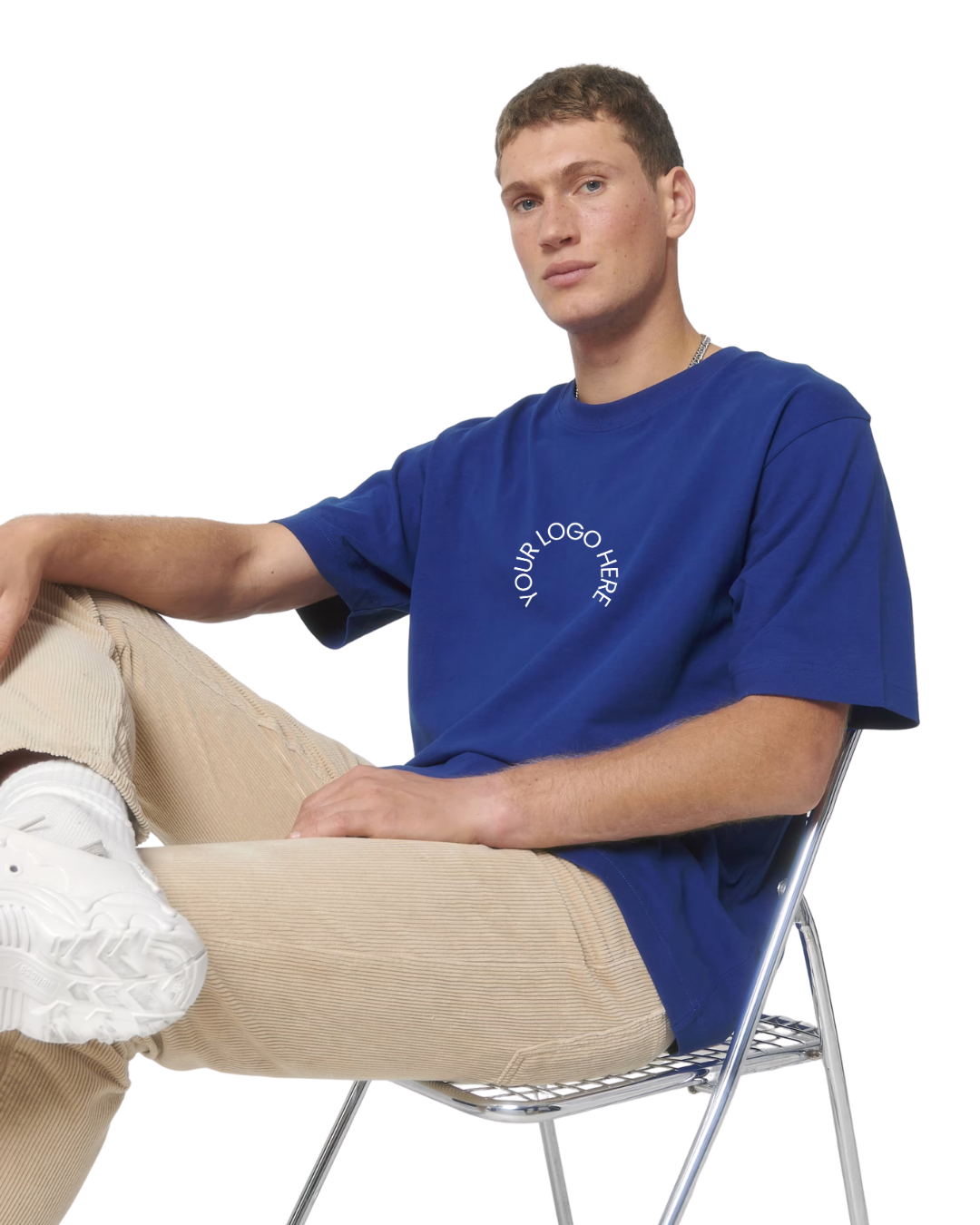 Guy in Blue shirt with logo on it
